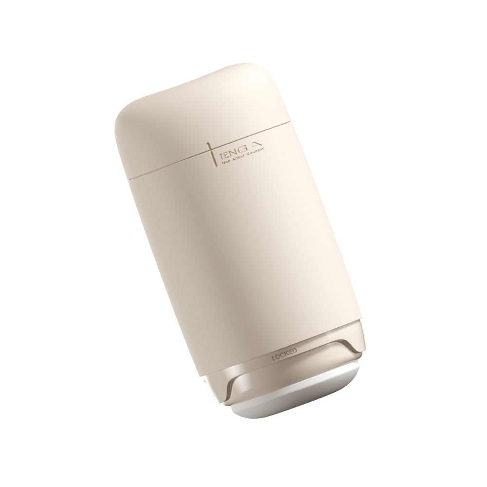 A beige Tenga Puffy Soft Stroker with "Tenga New Adult Concept" and "Locked" visible.