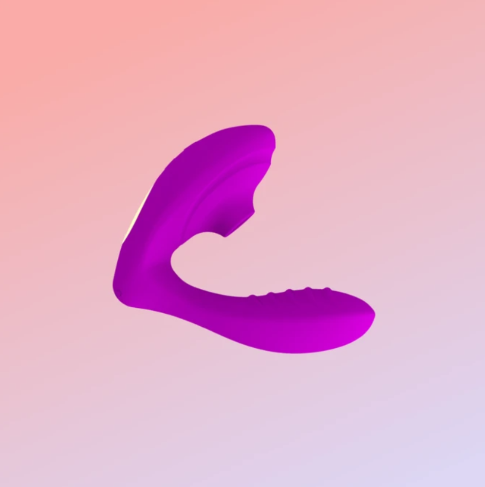 Purple silicone vibrator with a curved shape for dual stimulation.