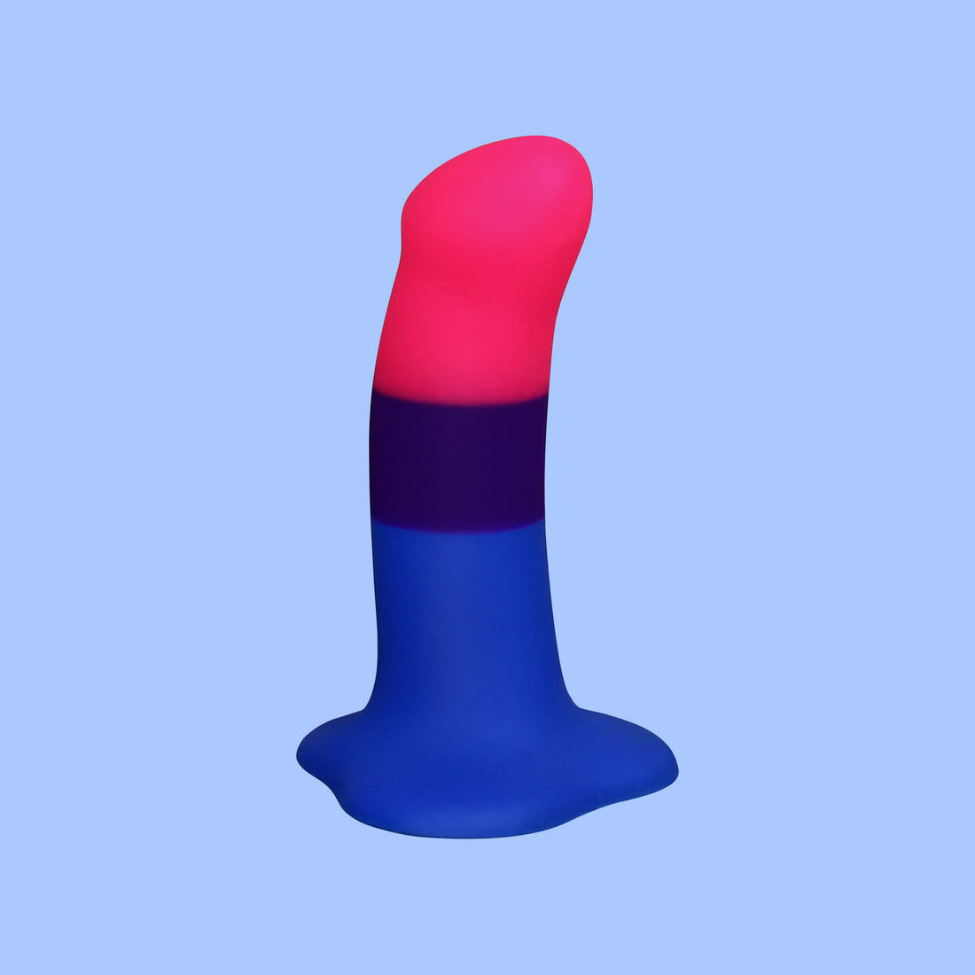 A dildo with pink, purple, and blue stripes on a light blue background.