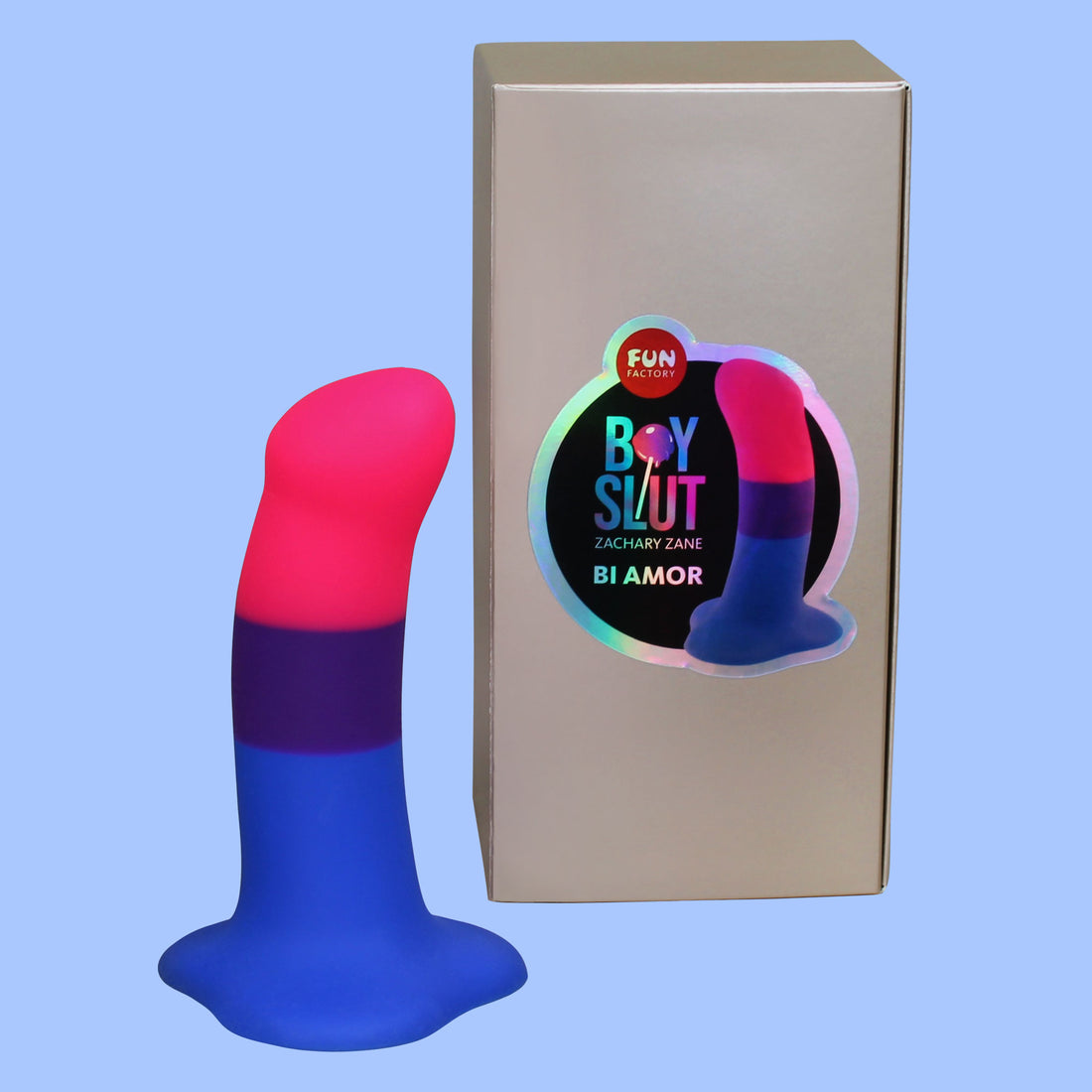 A bisexual pride colored dildo next to its box.