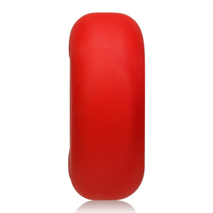 Red silicone cock ring and ball stretcher.