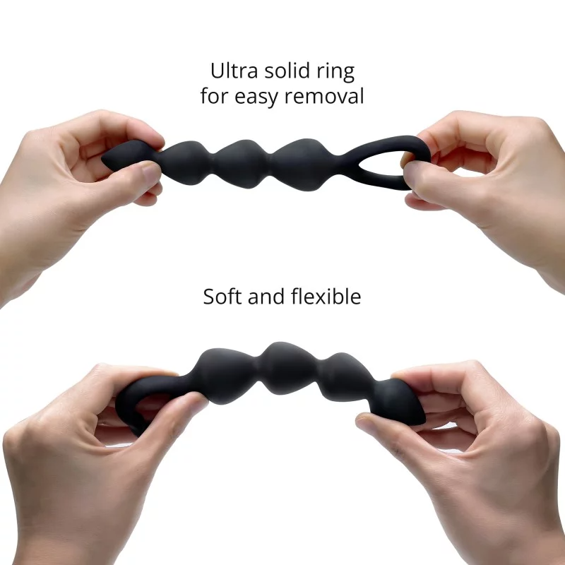 Black silicone graduated anal beads with a loop handle.