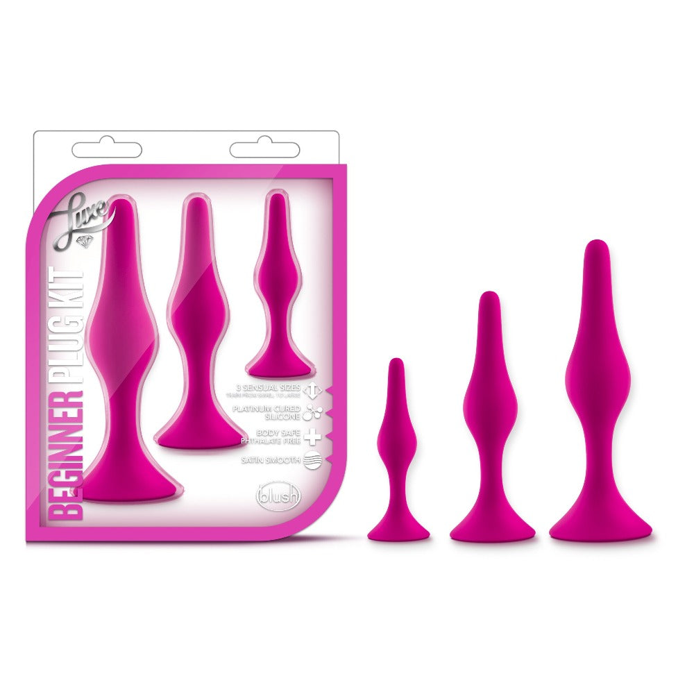 Pink silicone anal plug starter kit with three graduated sizes.