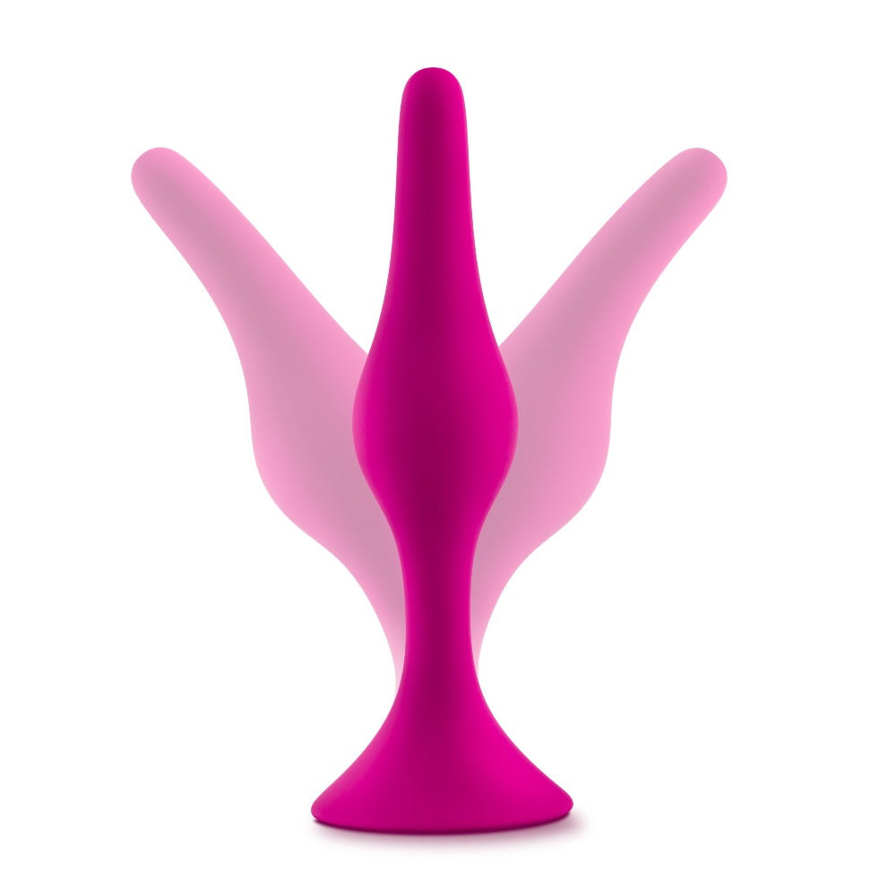 Pink silicone anal plug starter kit with three graduated sizes.