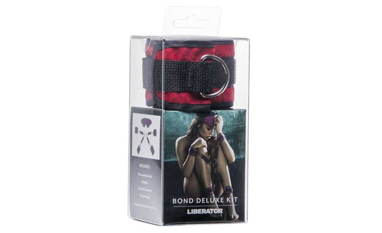Bondage restraint kit with red microvelvet cuffs and blindfold.