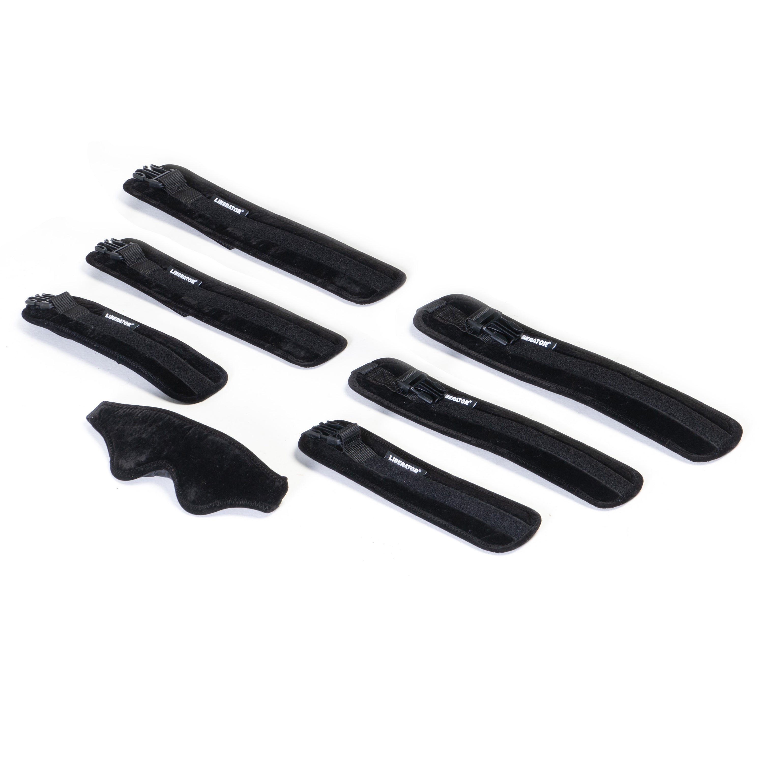 Black padded restraints with zippers and Liberator branding.
