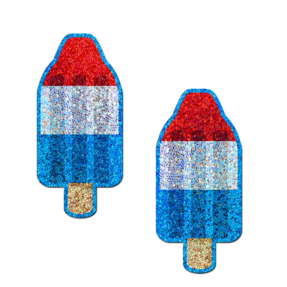 Two glitter ice pop shaped nipple pasties in red, white, and blue.