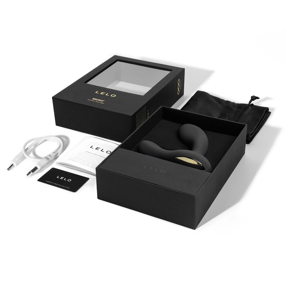 A black Lelo Bruno prostate massager in its box with accessories.