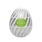 Tenga Egg Brush textured male masturbator with a white and silver striped pattern.