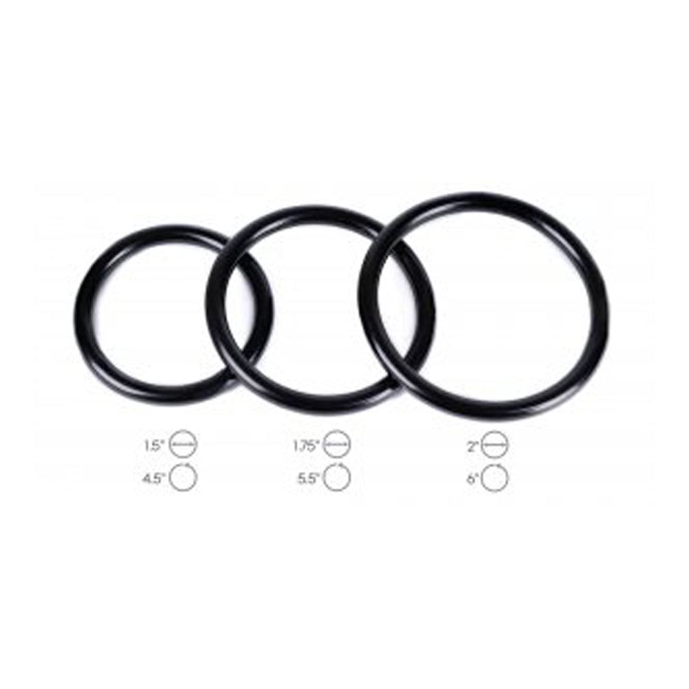 Three black metal cock rings of graduated sizes.