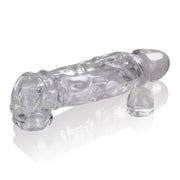 Clear cock sheath with textured shaft and removable bulbous insert.