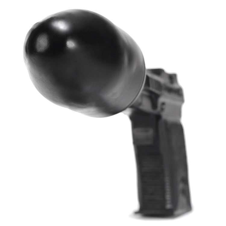 Black silicone pistol-shaped anal plug.