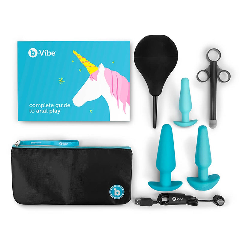 A b-Vibe anal training kit with silicone butt plugs, enema, applicator, and guide.