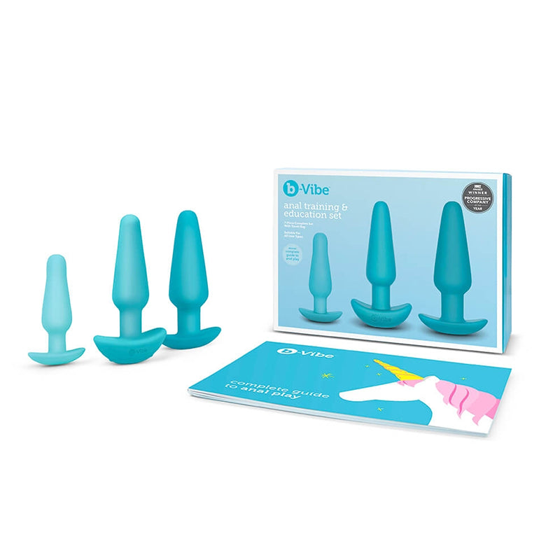 A set of three teal silicone butt plugs with a guide.
