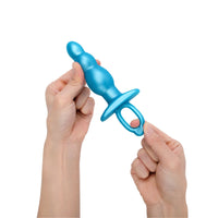 A blue beaded silicone anal plug with a flared base and finger ring.
