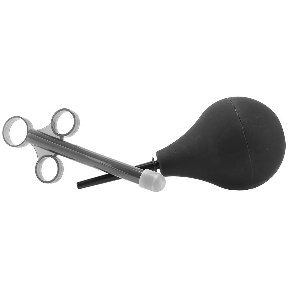 A black silicone bulb attached to a metal instrument with finger loops.