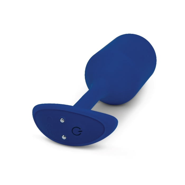 A navy blue silicone vibrating snug plug with a power button.