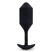 Black silicone vibrating snug plug with a flared base.