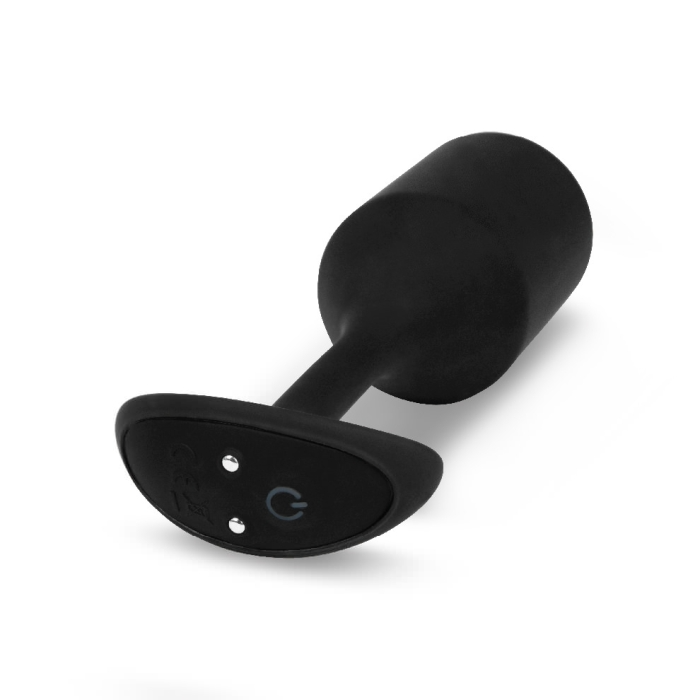 A black vibrating snug plug with a power button and two smaller buttons on the base.