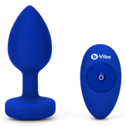 A blue silicone anal plug and a matching remote control.