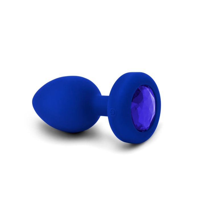 Navy silicone vibrating anal plug with a large blue jewel accent.