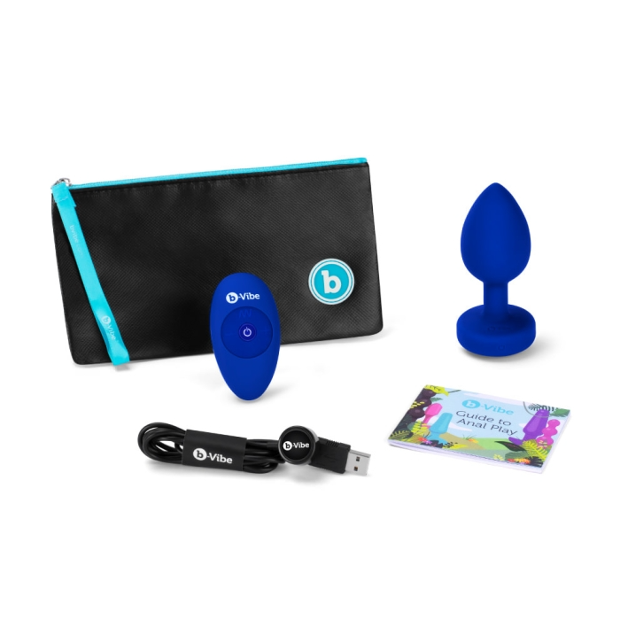 A navy blue vibrating anal plug set with a remote, charging cable, storage pouch, and guide.