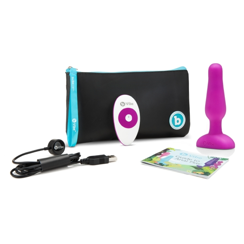 Fuchsia vibrating anal plug set with remote and travel case.