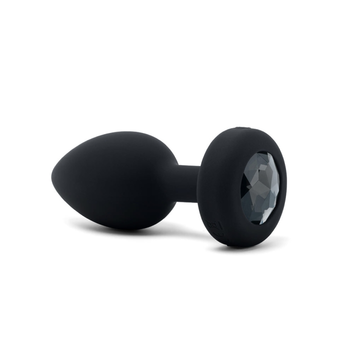 Black silicone anal plug with a faceted jewel accent.