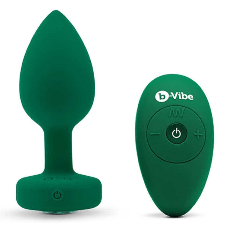 A green silicone anal plug and remote control.