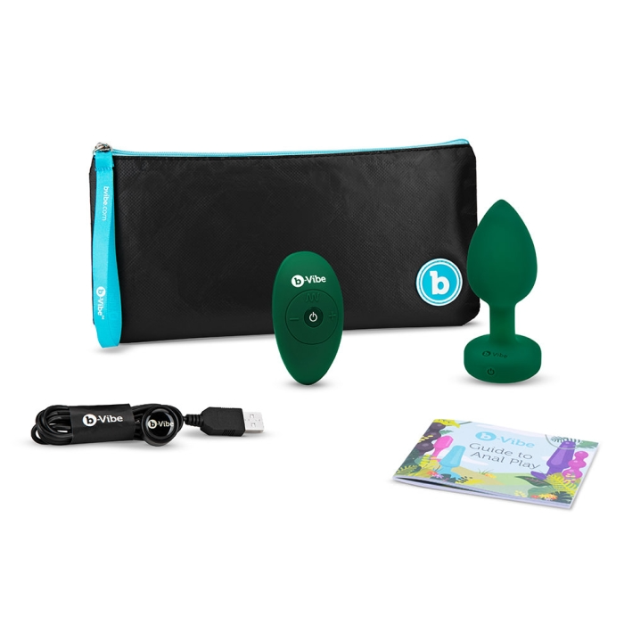 Green b-Vibe vibrating anal plug set with remote, charging cable, and pouch.