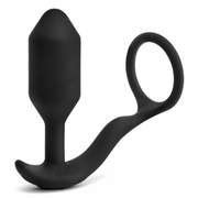 Black vibrating butt plug and penis ring with a curved tail and loop.