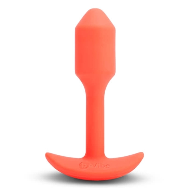 Orange silicone vibrating snug plug with a flared base.