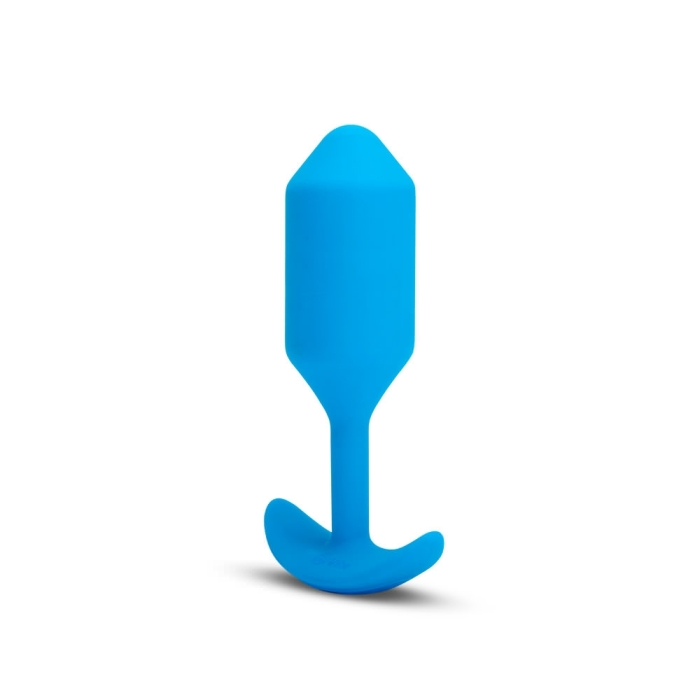 A large blue silicone vibrating snug plug with a curved base.