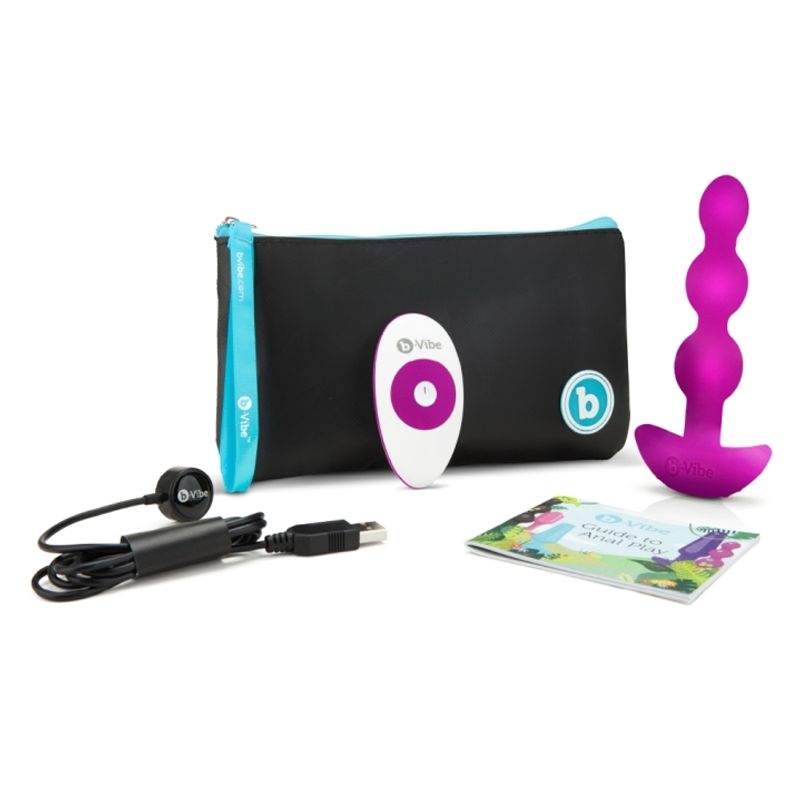 Fuchsia silicone vibrating anal beads with remote control, charging cable, and travel pouch.
