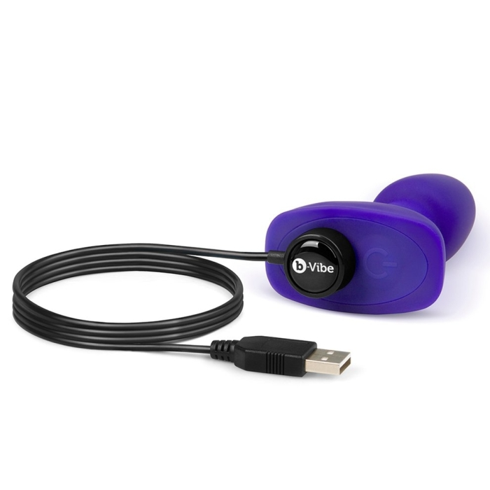 Purple b-Vibe Petite vibrating anal plug with USB cable.