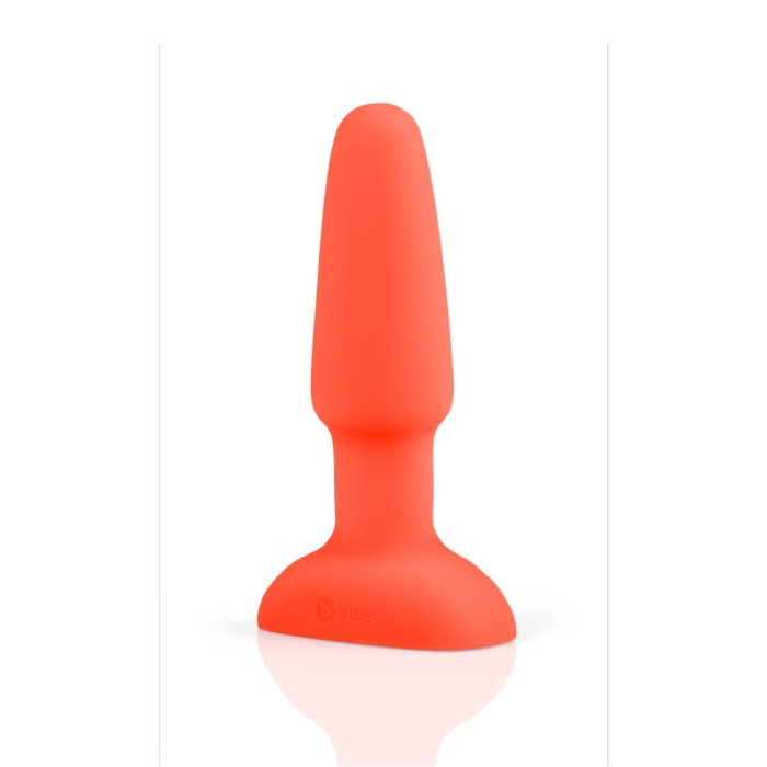 A bright orange anal plug with a flared base and a tapered tip.