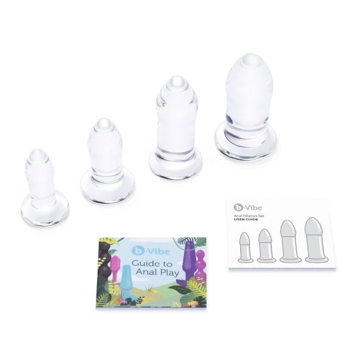 Four clear glass anal dilators of increasing size with a user guide.