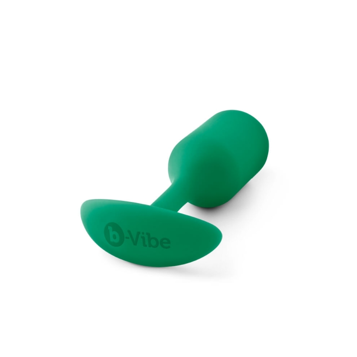 A green silicone weighted anal plug with the b-Vibe logo.