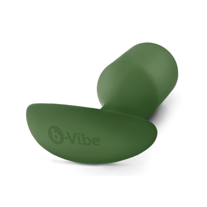 A green b-Vibe Snug Plug 4 weighted silicone anal plug.