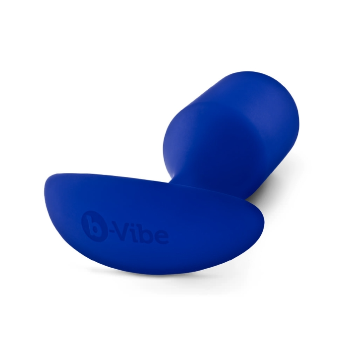A navy blue weighted silicone anal plug with the b-Vibe logo.