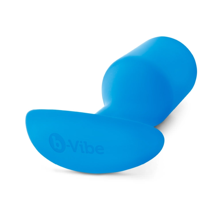 A blue weighted silicone anal butt plug with the b-Vibe logo.
