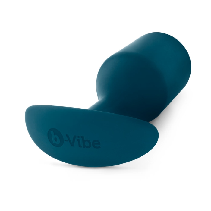 A marine blue weighted silicone anal plug with a flared base and the b-Vibe logo.