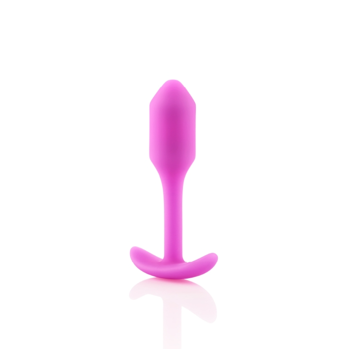 A fuchsia weighted silicone anal plug with a flared base.