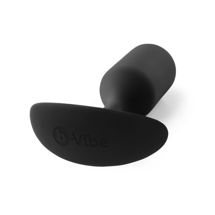 Black weighted silicone anal butt plug with a flared base.