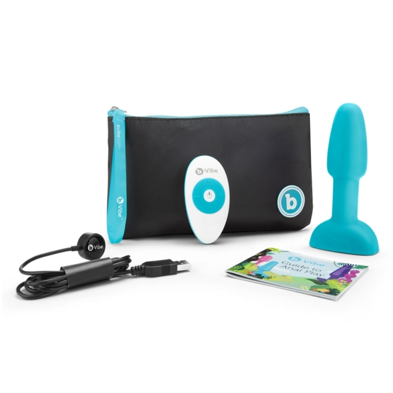 Teal vibrating anal plug with remote, charging cable, and instruction booklet.