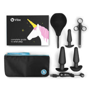 Anal training kit with silicone plugs, enema, applicator, and guide.
