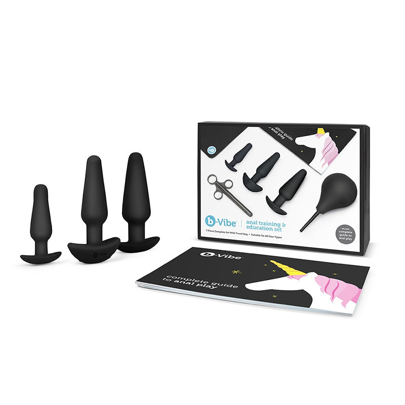 A b-Vibe anal training set with three silicone butt plugs, a lube applicator, enema, and guide.