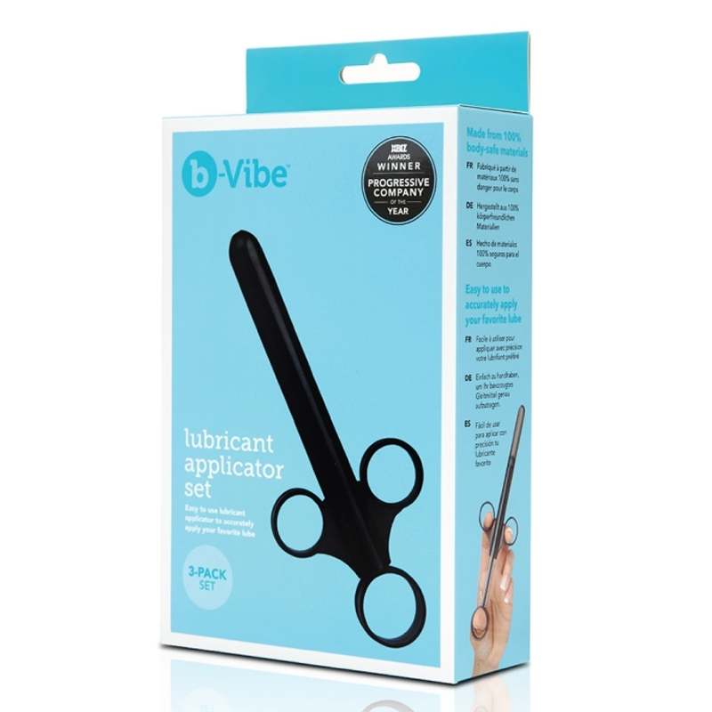 A black lubricant applicator set with three applicators on a light blue box.