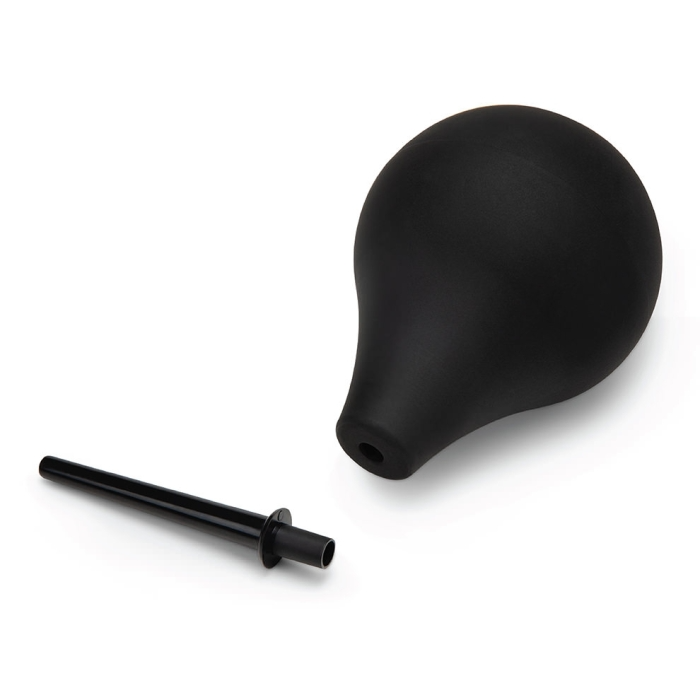 Black enema bulb with a detachable nozzle on a white background.