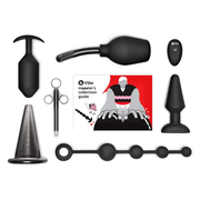 Black anal training kit with plugs, beads, enema, and guide.